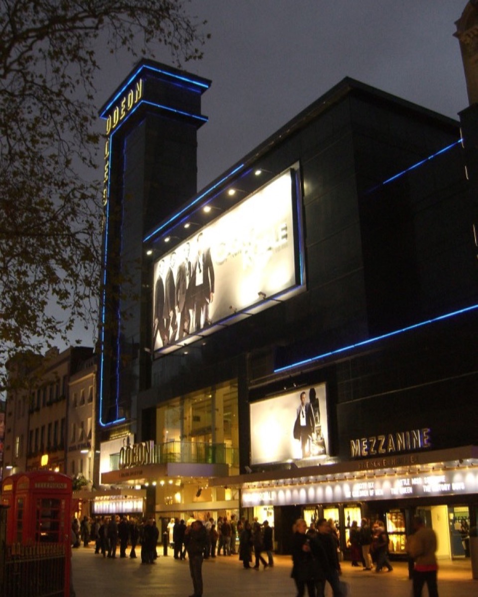 Cinema seats facing a big-screen movie projection